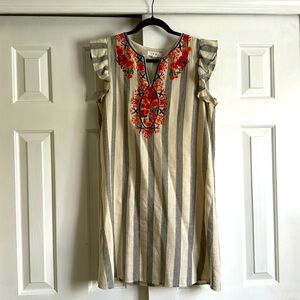 THML size large navy and cream striped embroidered dress with ruffled sleeves.